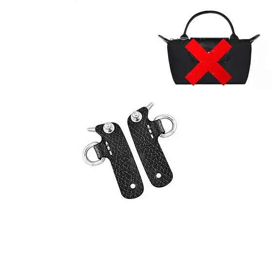 Black leather crossbody strap with a red cross design