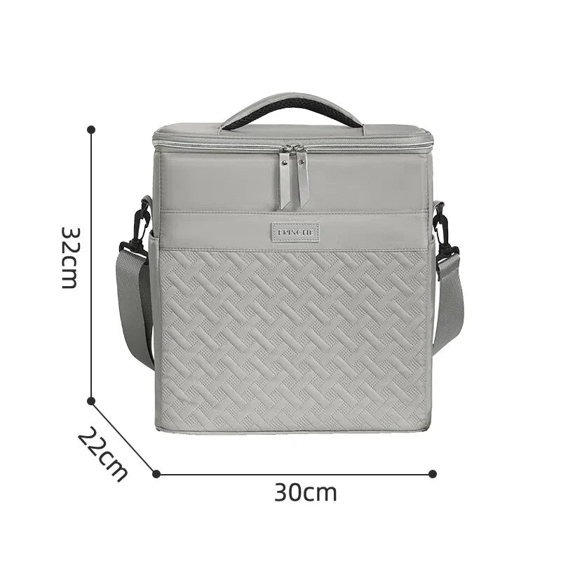 A light gray insulated picnic cooler backpack shown with dimensions 32cm high and 30cm wide.