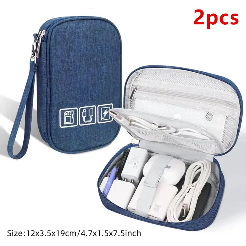 Two blue digital organizer storage pouches, one closed and one open showing various electronic accessories.