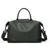 A dark gray durable nylon travel duffle bag with black leather accents and a top handle.