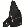 Black quilted crossbody sling bag with gold hardware shown from the side.
