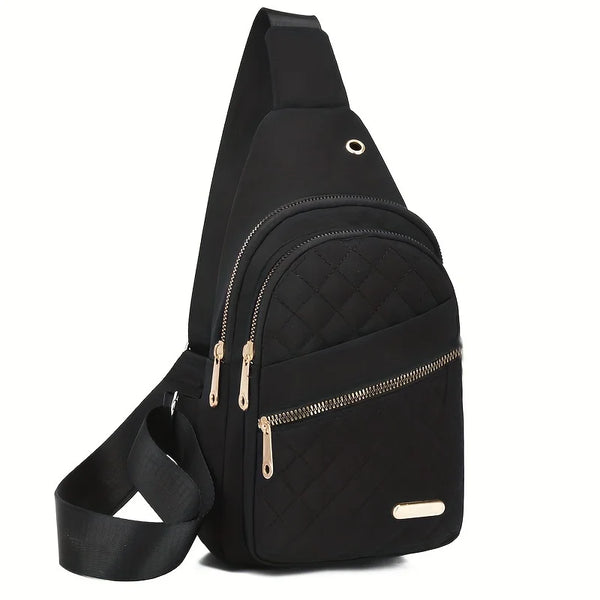Black quilted crossbody sling bag with gold hardware shown from the side.