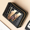 A black PU leather double-zip clutch wallet with a gold geometric design and floral accents.