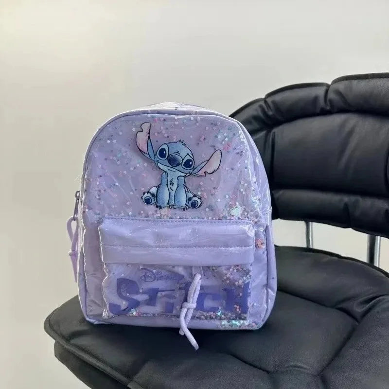 A lavender backpack featuring a Stitch design and sparkling accents resting on a black leather chair.