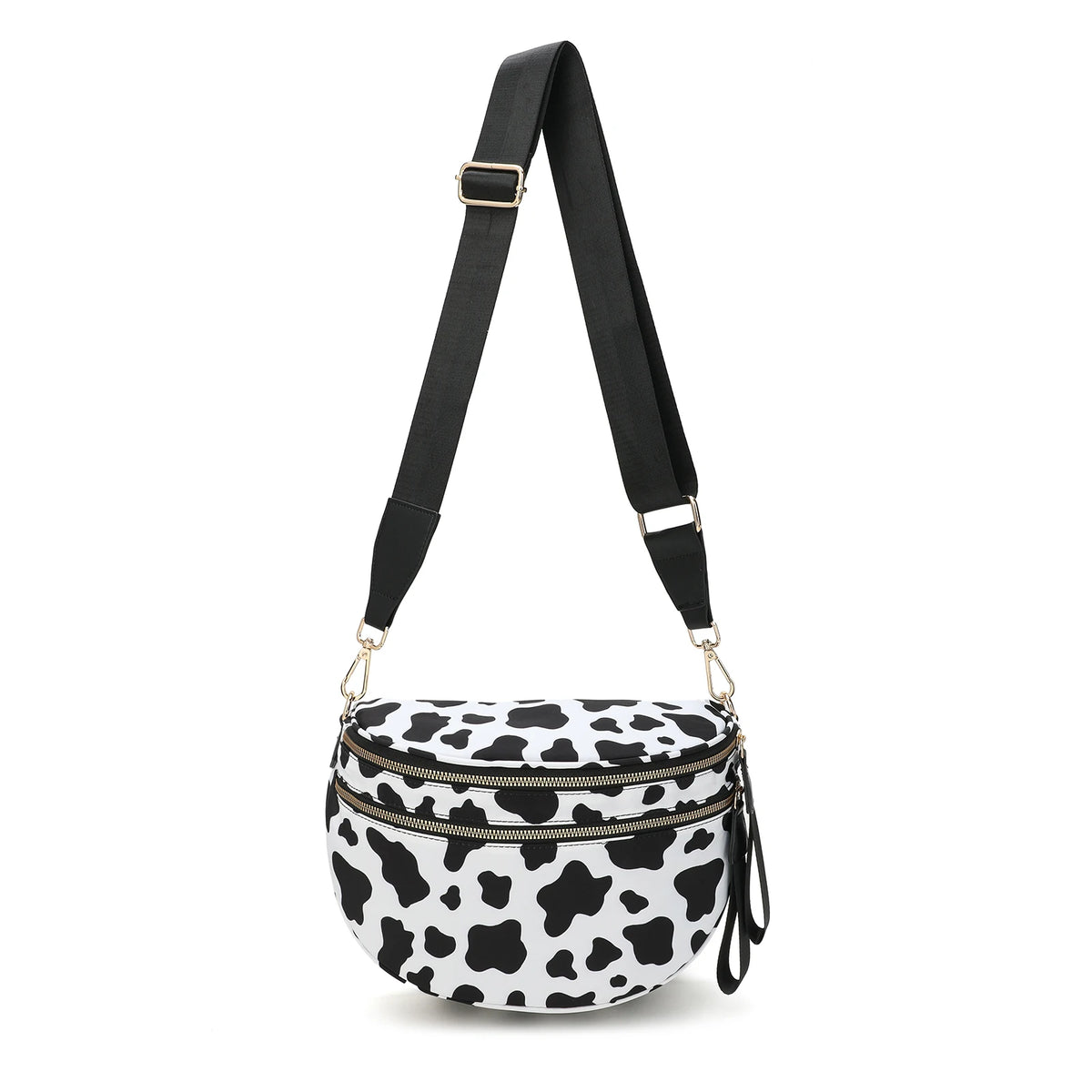 Black nylon crossbody bag with a white cow print pattern and black adjustable strap
