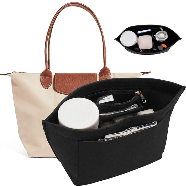A black felt organizer insert for handbags, showing various small accessories like a compact mirror and pens.