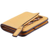 A tan leather compact bi-fold wallet with a dark brown trim and silver hardware.