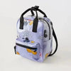 A purple and white patterned fashion backpack with black straps.