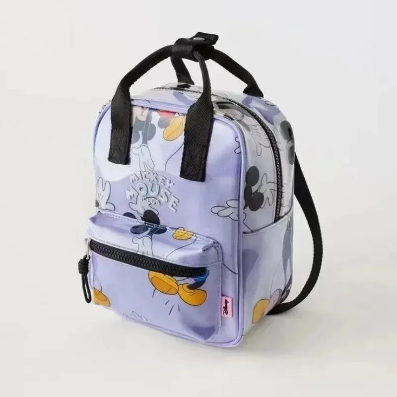 A purple and white patterned fashion backpack with black straps.