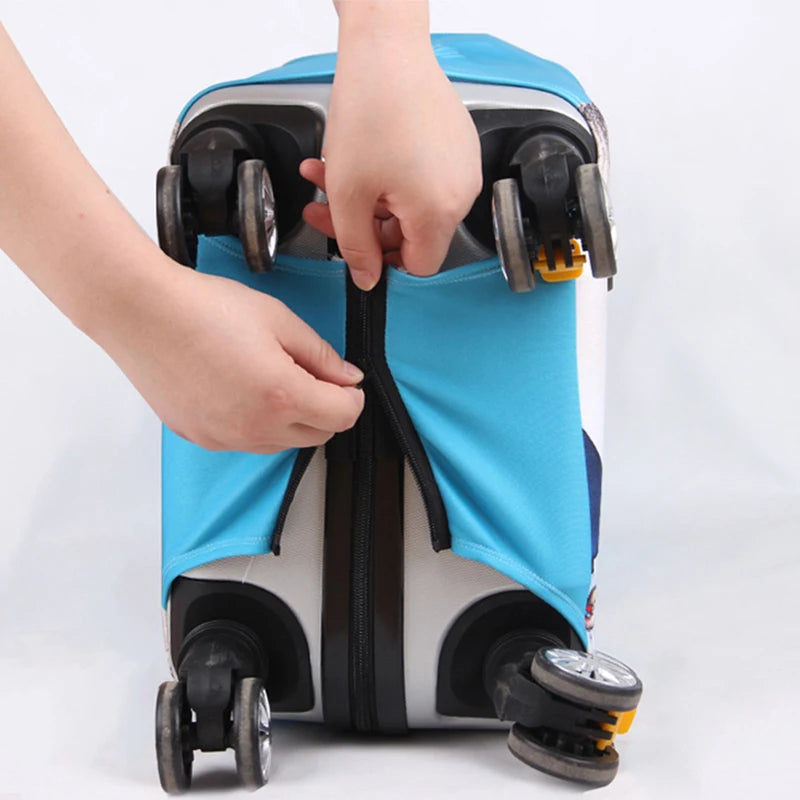 A hand is opening the protective cover of a suitcase, showing the blue fabric and wheels.