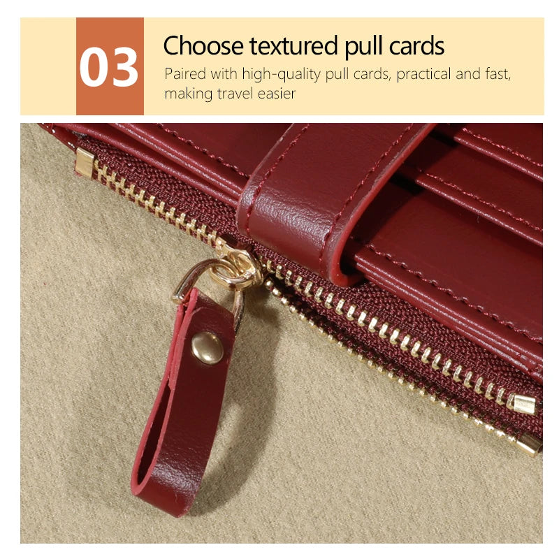 A close-up of a maroon PU leather card wallet with a gold-toned pull tag and visible zipper detail.