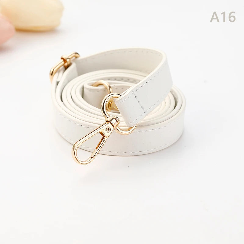 A roll of beige PU leather strap with a gold-toned clasp and hardware.