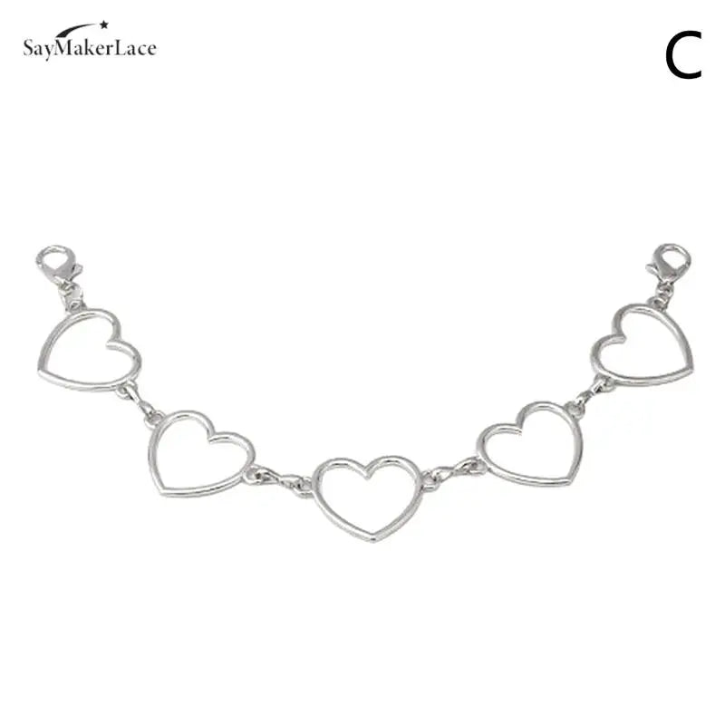 Silver multi-layer metal chain strap used as a shoulder bag charm