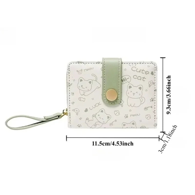 A light green cartoon cat coin purse and card holder wallet with a textured white background.