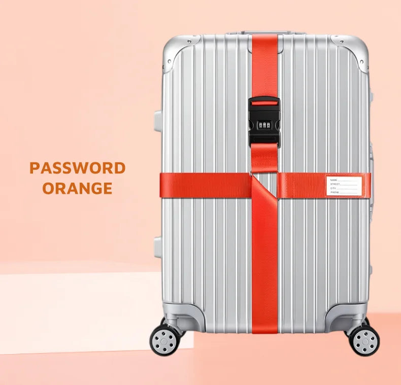 Silver rolling suitcase with orange cross straps and bundling belts