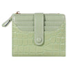 A light green PU leather card wallet with a crocodile texture and a flap closure.