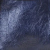 A dark blue soft PU leather shoulder tote bag viewed from above.