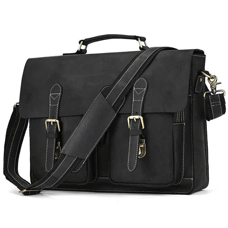 Black vintage Crazy Horse leather briefcase with a handle and shoulder strap.