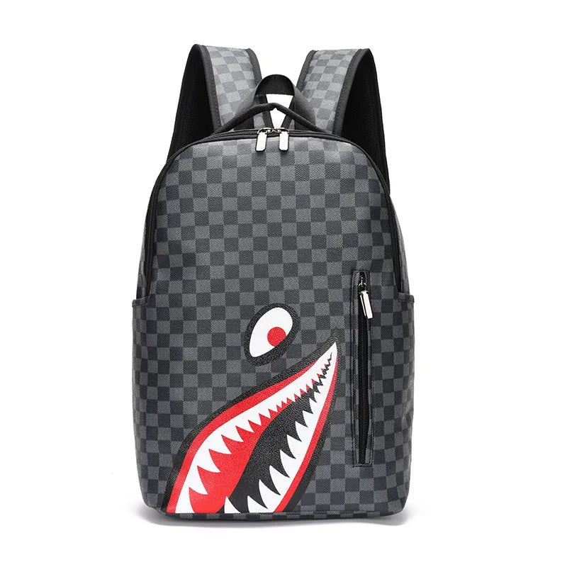 A gray plaid laptop backpack featuring a red and black shark mouth design.