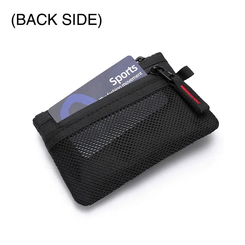 Black sports travel wallet with a zipper and carabiner clip shown from the back side.