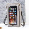 Helle beige multifunktionale Umhängetasche mit klarem Front, die eine Smartphone-Oberfläche zeigt.