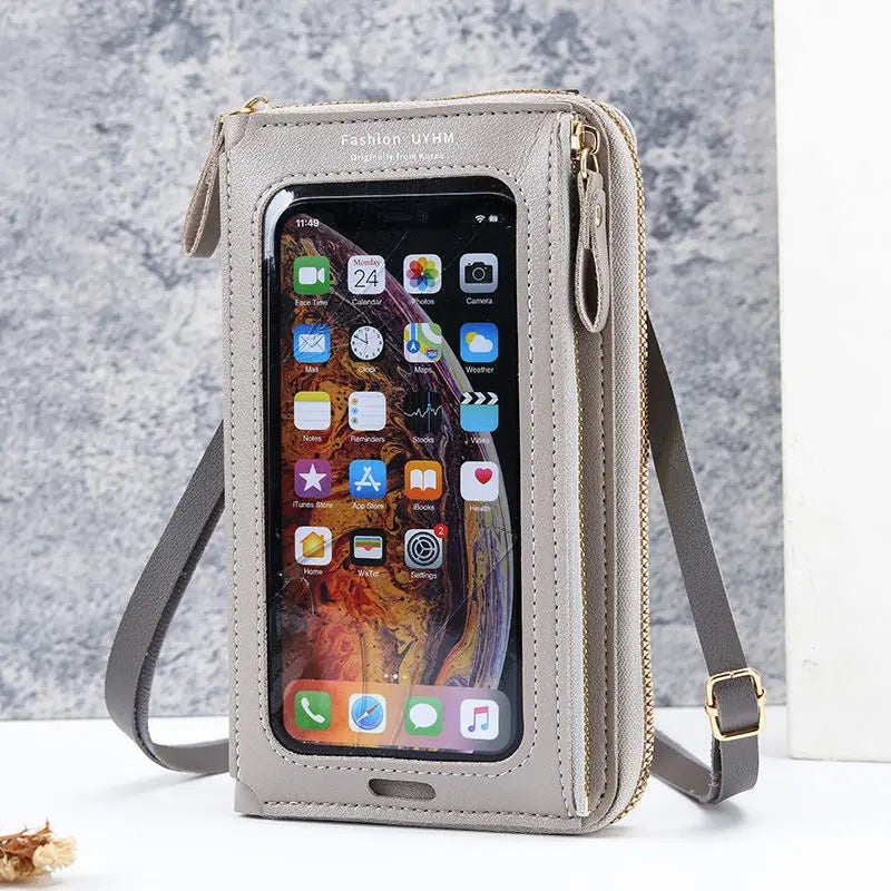 Helle beige multifunktionale Umhängetasche mit klarem Front, die eine Smartphone-Oberfläche zeigt.