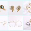 A collection of 18K gold plated jewelry chains and findings for DIY crafting, including gemstone pendants and hoop earrings.