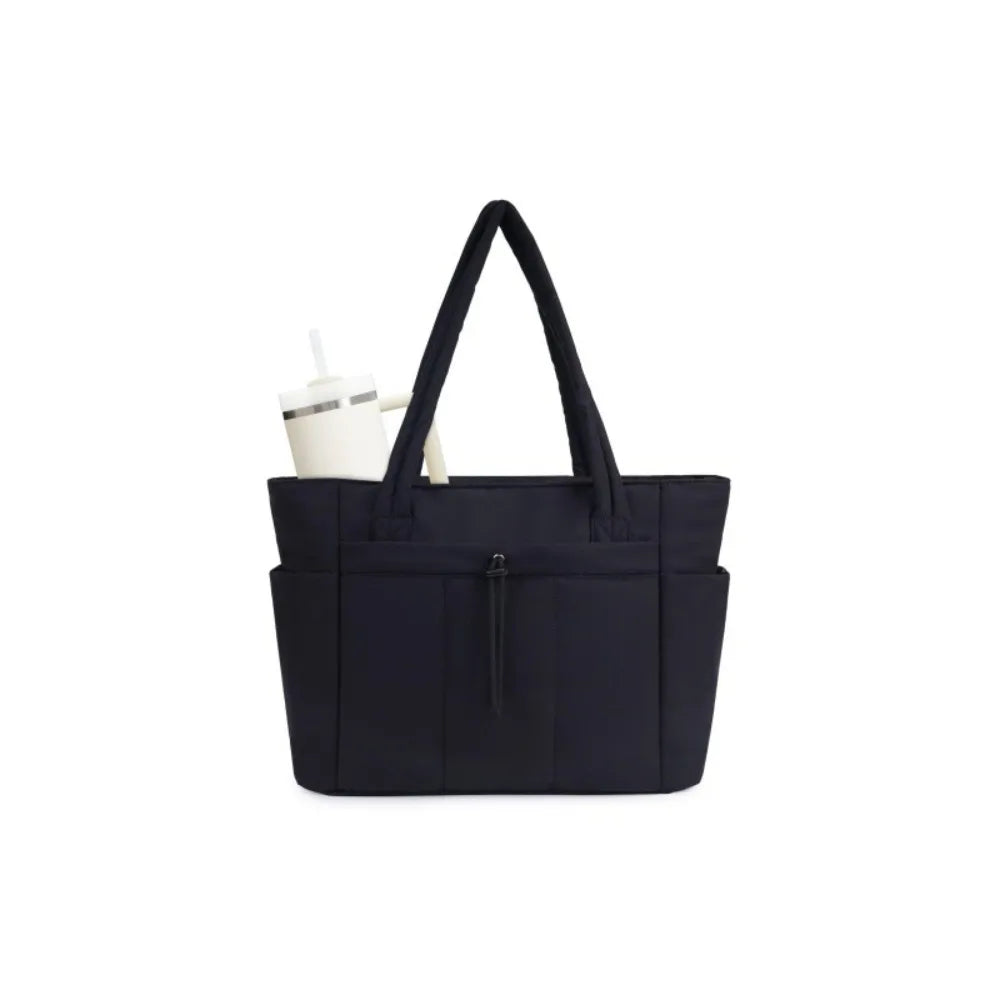 A navy quilted padded tote bag with a handle and multiple pockets is shown against a white background.