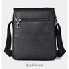 Back view of a black PU leather messenger bag with a zippered compartment and adjustable strap.