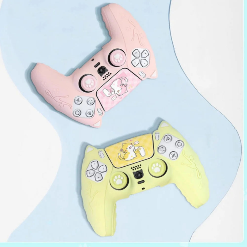 A pink cat-themed silicone grip cover for a PlayStation 5 controller is shown against a light blue background.