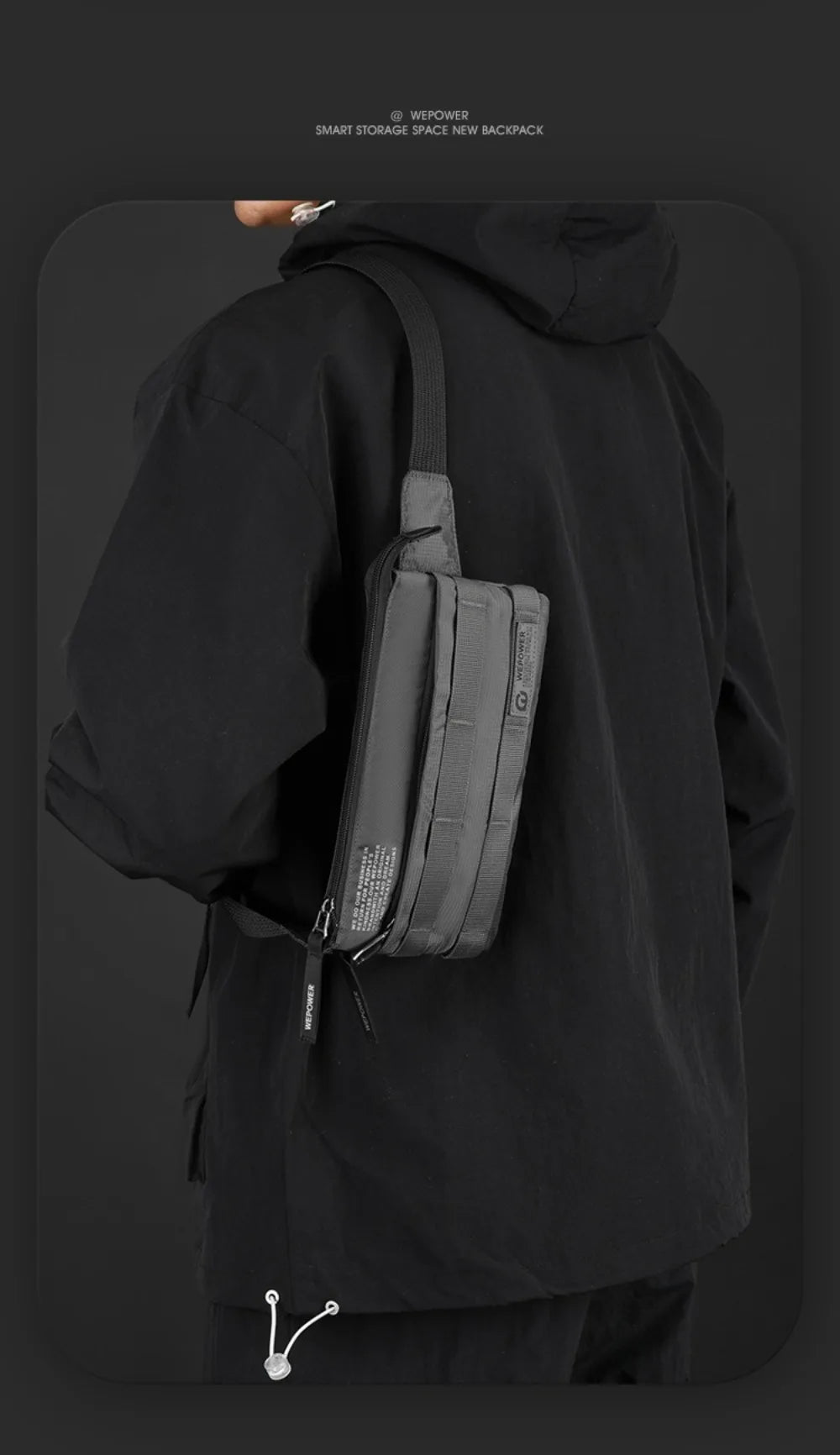 A black hoodie features a black chest bag worn on the shoulder.