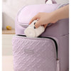 A purple insulated picnic cooler backpack being opened to show the front and side pockets.