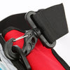 Close-up of a black and red trauma bag with a black strap and silver zipper pull.
