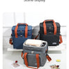 Présentation de diverses glacières de pique-nique isolées dans les couleurs marine, gris et noir avec des accents orange.