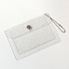 Clear acrylic card holder wallet with a silver charm and a chain attached