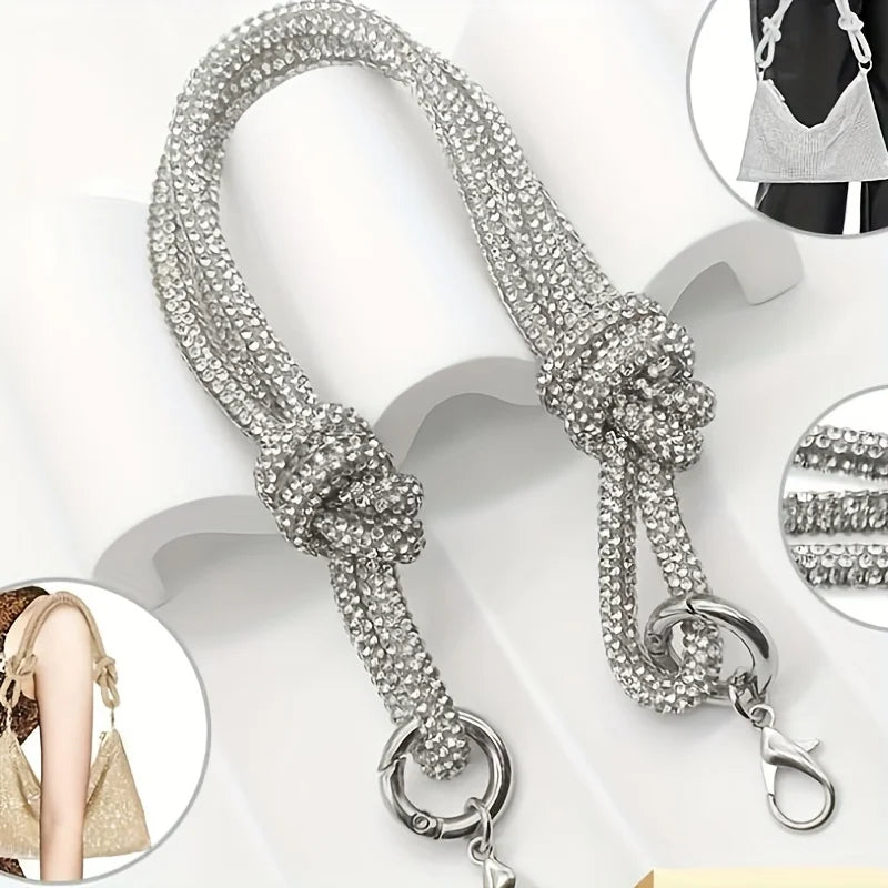 Silver crystal rhinestone handbag chain strap featuring a knot detail and a lobster clasp.