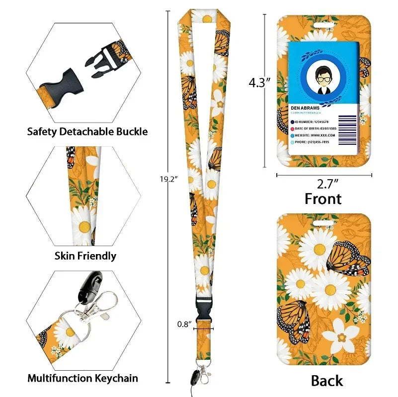 A yellow and orange patterned retractable badge reel with a neck strap lanyard and keychain.