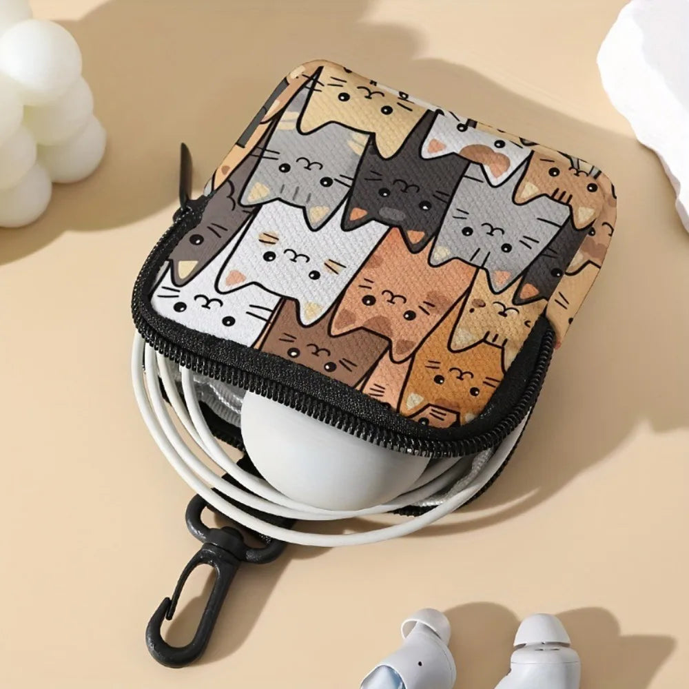A stylish printed coin purse and multi-use earphone case featuring a pattern of cats in various colors.