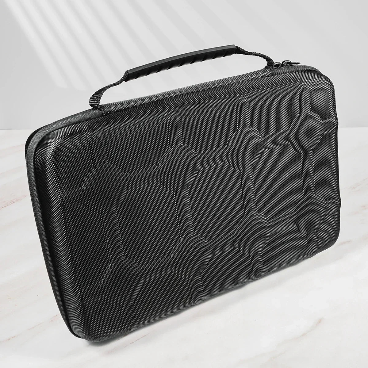 A black premium leather watch organizer travel case with a textured pattern is shown on a white surface.