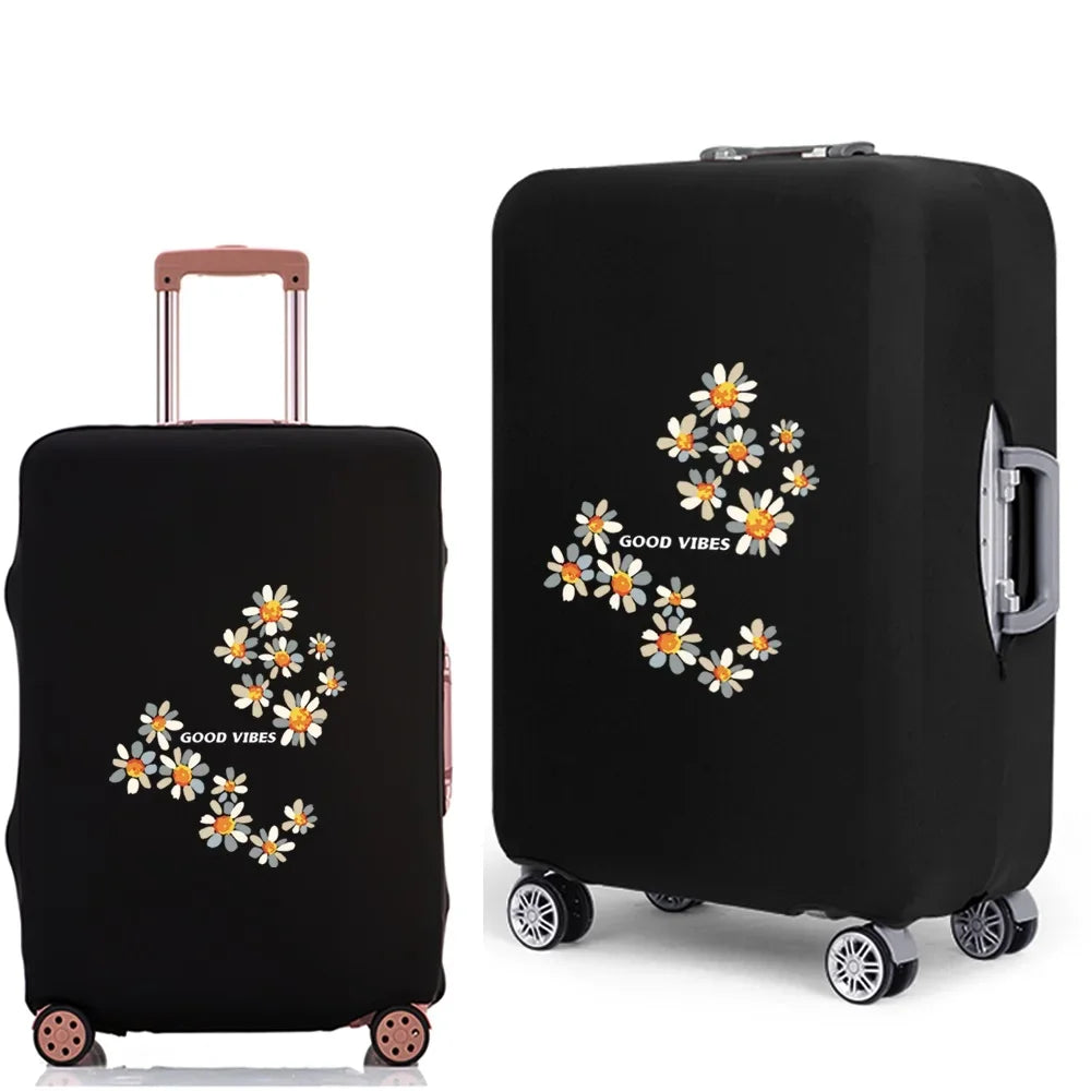 Black rolling suitcase with a floral design and a protective dust cover.