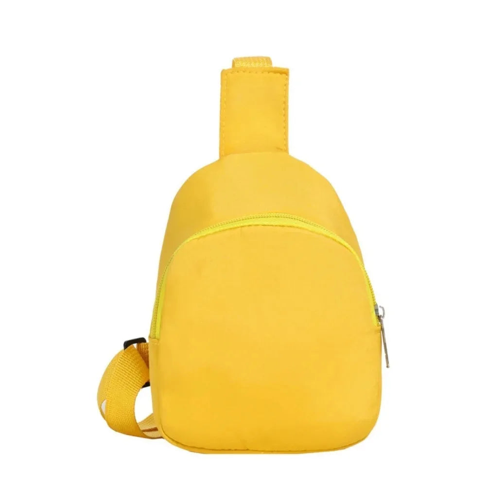 A bright yellow nylon crossbody bag for kids.