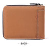 A brown leather card clip wallet shown from the back with stitched edges and a black cord.