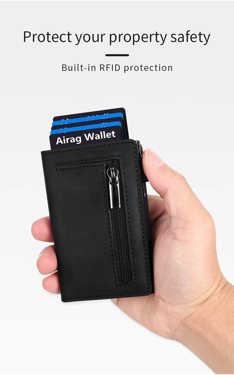 A hand holds a black minimalist magnetic wallet with an Airag Wallet card inside.