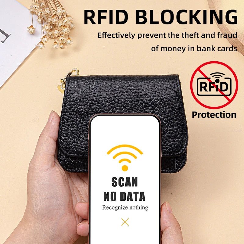 A black genuine leather wallet is shown being held by a hand, with a smartphone screen displaying a scan no data message.