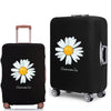 Black rolling suitcase with a white daisy design and the word Chamomile on the side