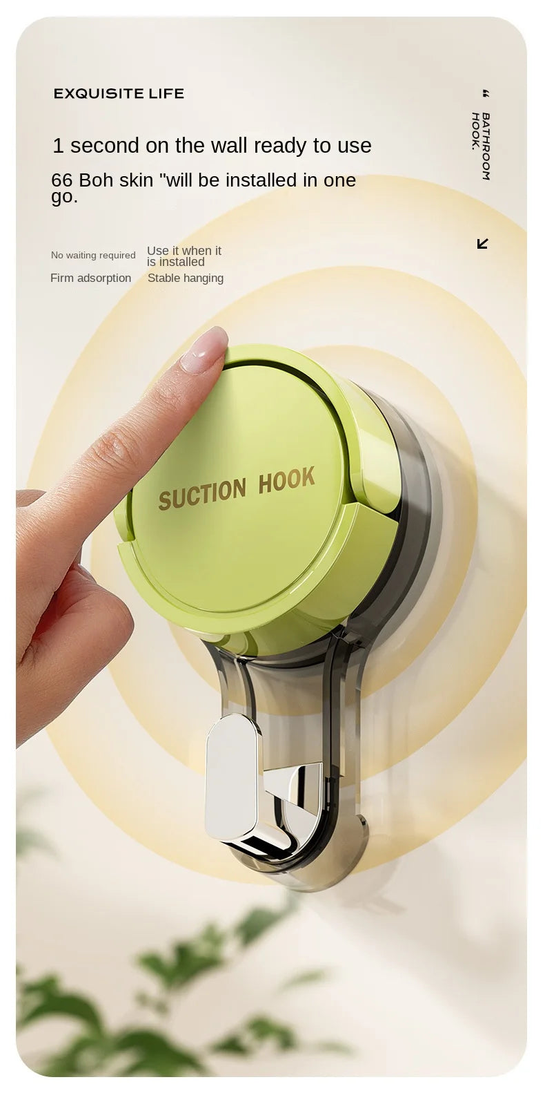 A hand is installing a silicone suction hook onto a smooth wall surface, demonstrating its use for hanging items.