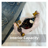 A pink retro PU leather shoulder bag is shown open, displaying its interior capacity and detailing.