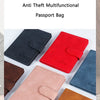 A collection of leather passport bags in various colors including black red pink and blue displayed on a white background.