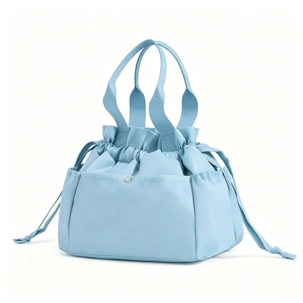 Light blue insulated drawstring lunch bag with multi-pocket storage
