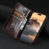 A brown leather flip case holds a smartphone and several cards.